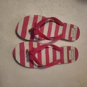 Kate Spade New York Fifi flip-flops featuring pink and white stripes with a gold